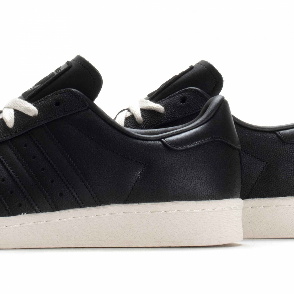 Adidas superstar black hotsell and white leather
