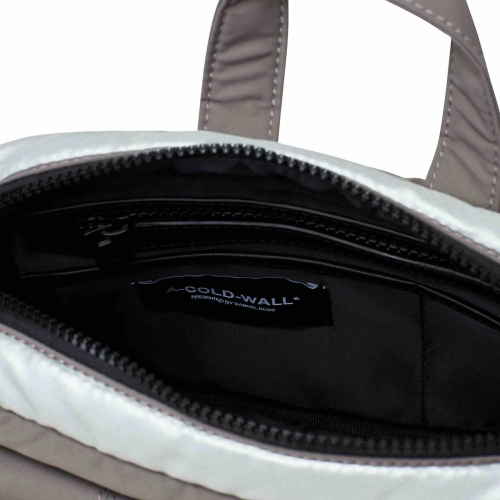 Acw cross outlet body bag