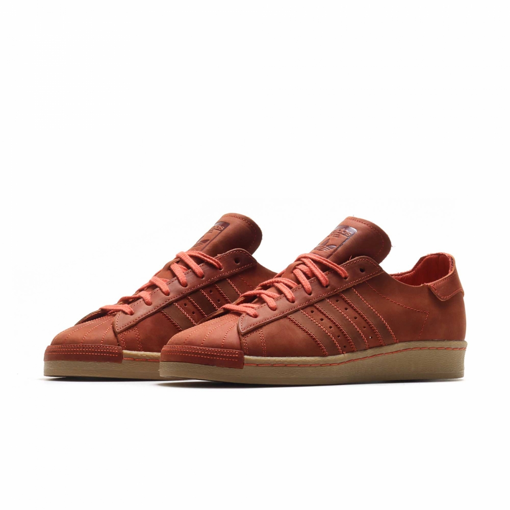 Adidas superstar on sale suede orange