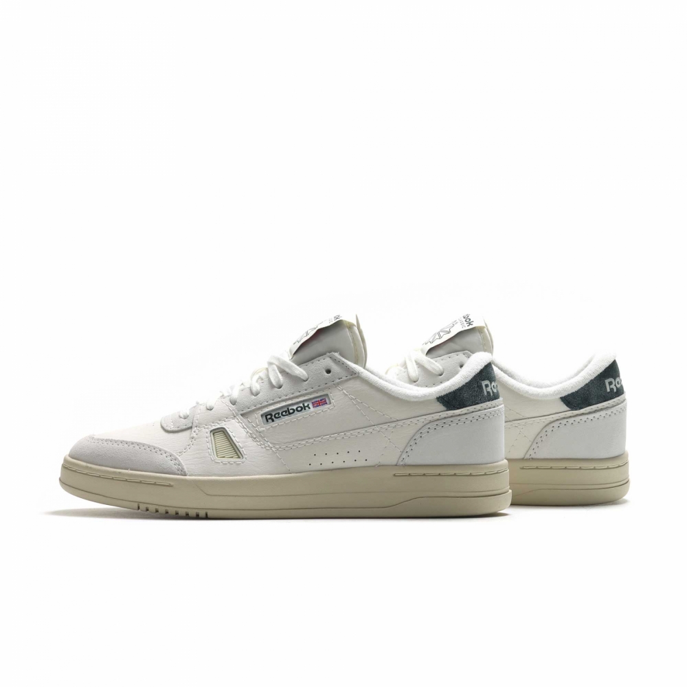 Green and white reebok classics top