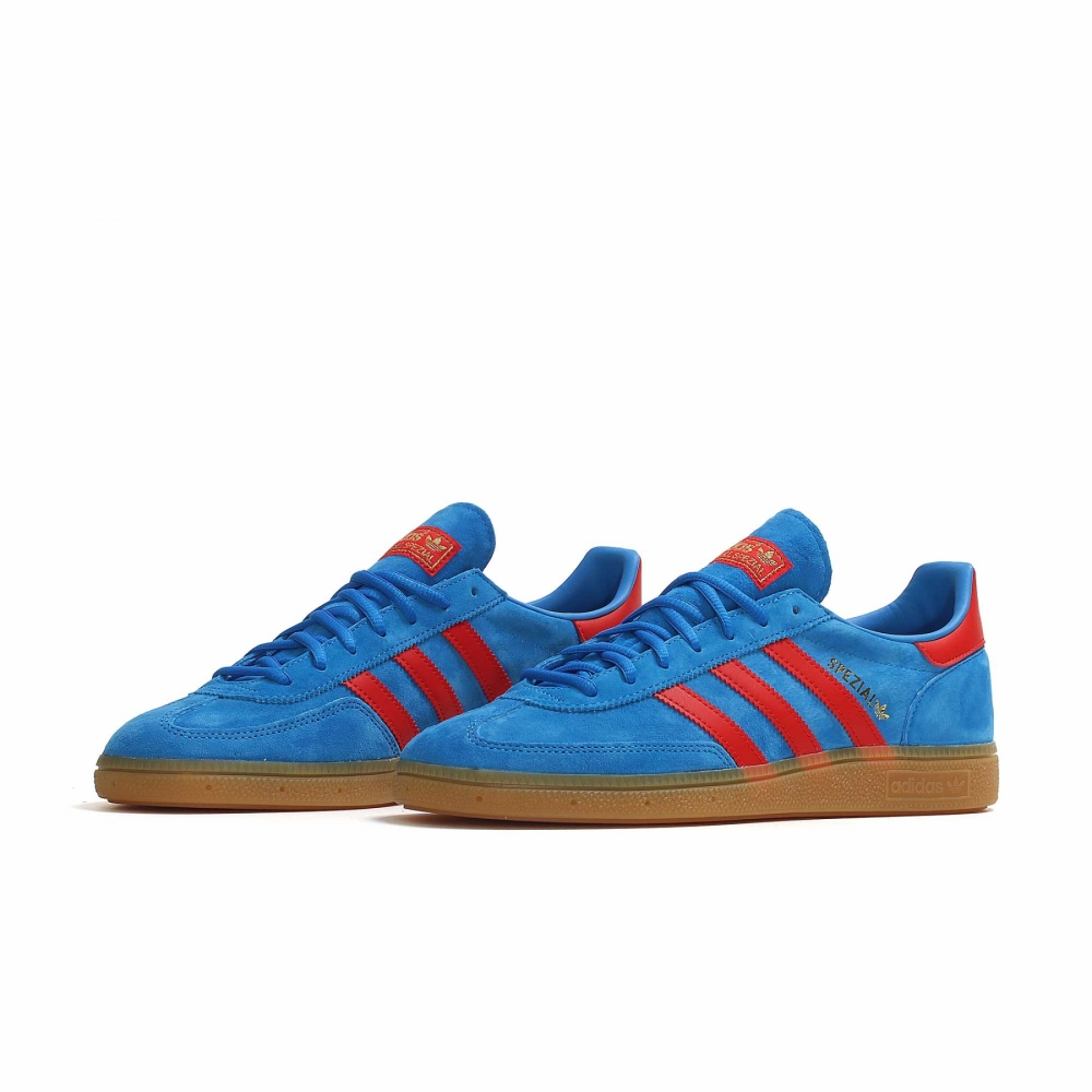 Bright blue top adidas trainers